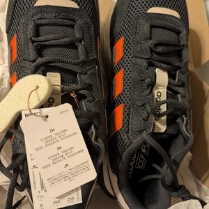 adidas Black Mesh Sneakers with Orange Stripes